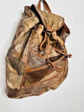 Vintage 1980s/90s Brown Leather Patchwork Clip Front Drawstring Backpack Bag